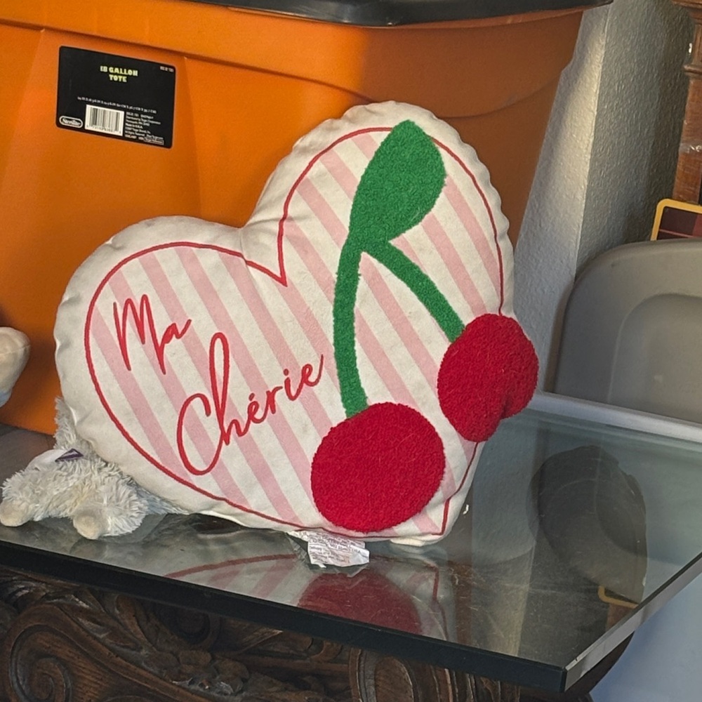 Target Heart-Shaped Pillow with Red and Green Design